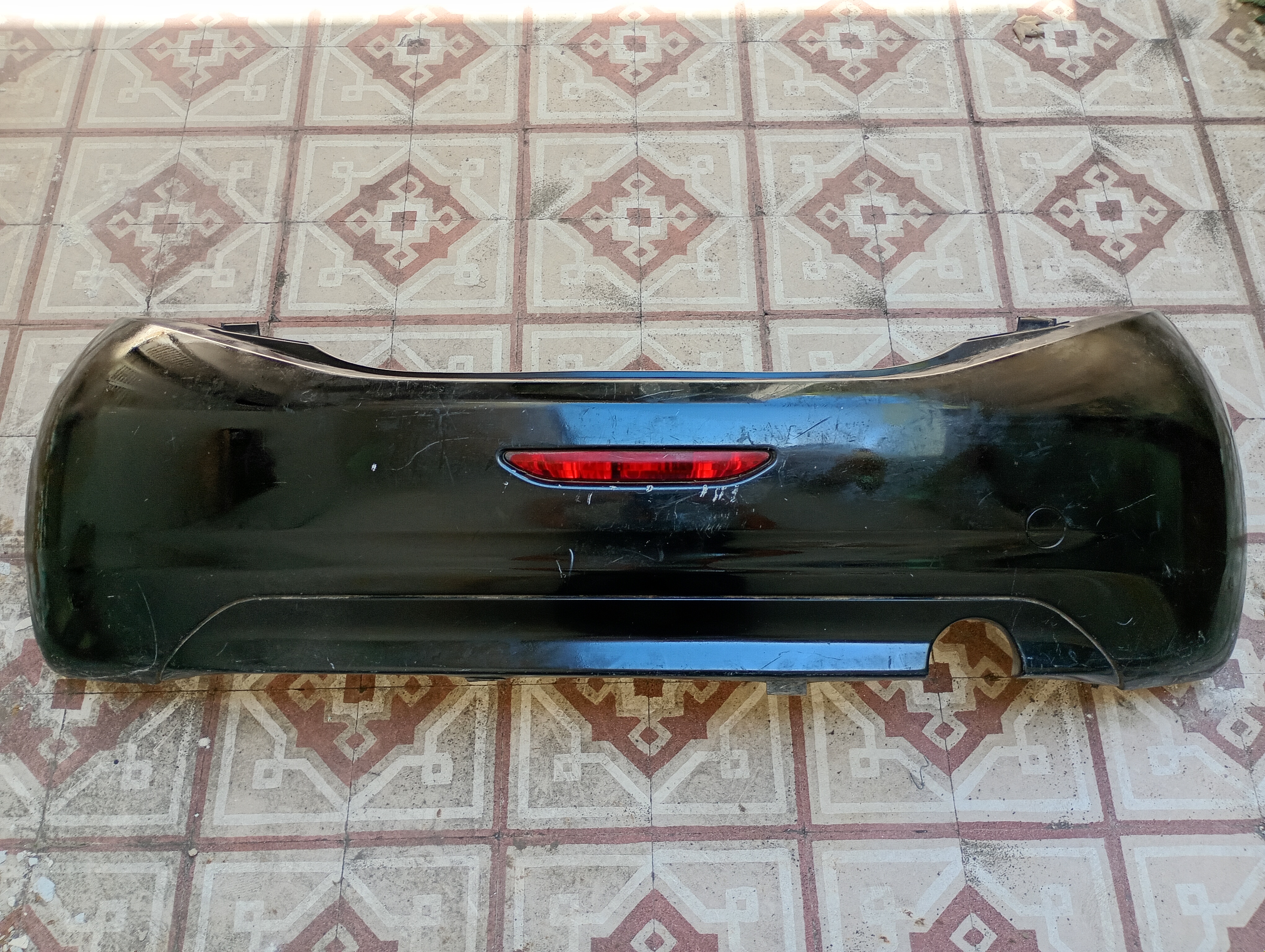 PARAGOLPE TRASERO ORIGINAL USADO PEUGEOT 208